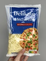 Сир моцарелла тертий Delikate 300 г